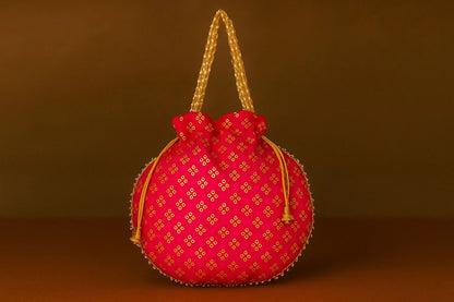 Handcrafted Silk-Blend Potli Bag with Golden Zari Motifs & Pearl Handle